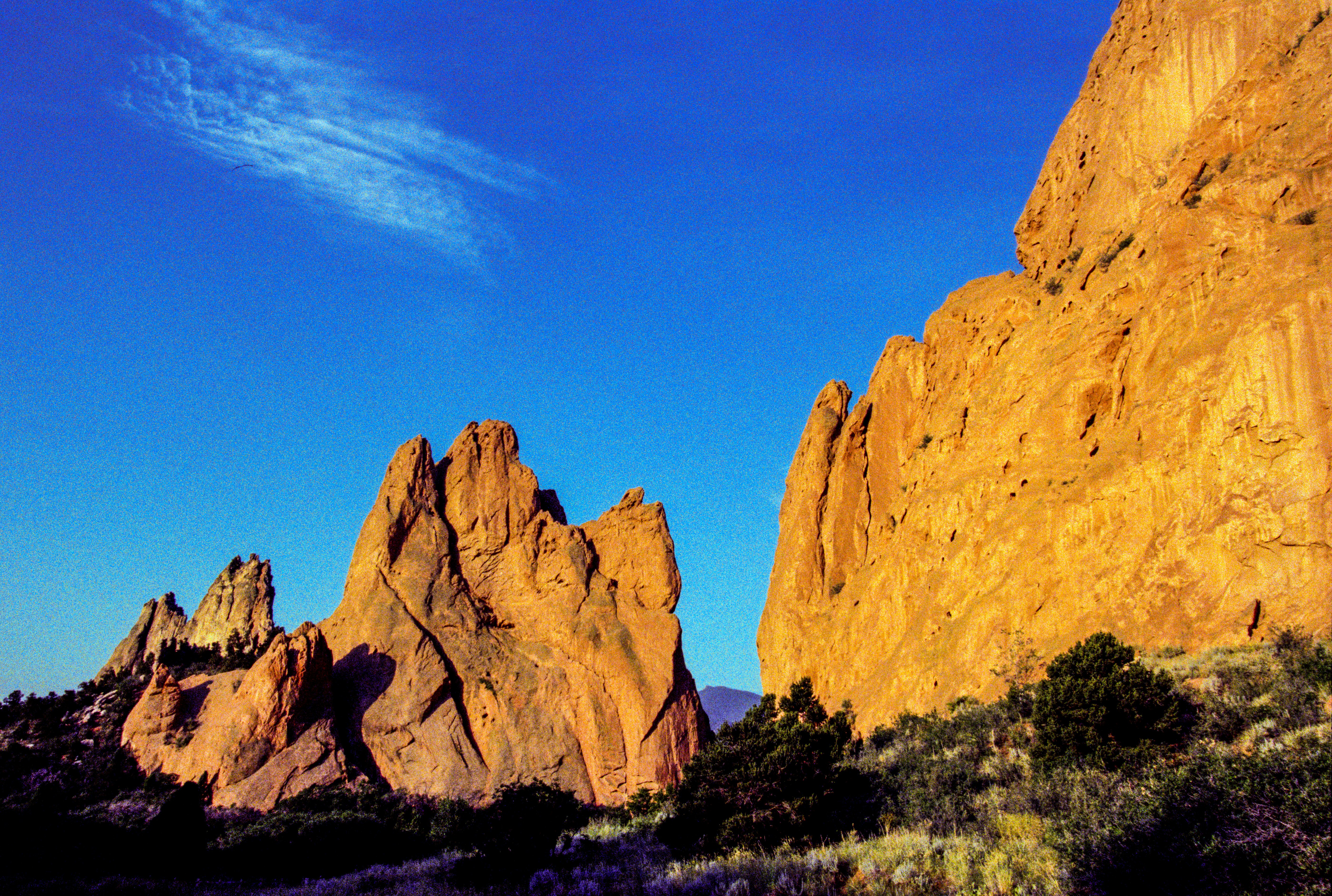 brown rock formation under blue sky during daytime